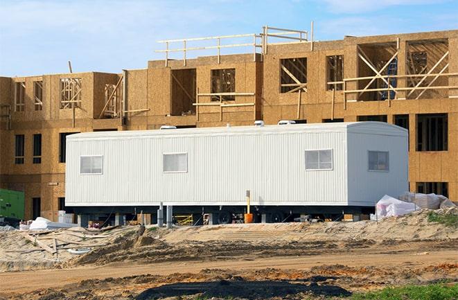 construction office rentals with signage for leasing information in Islandia